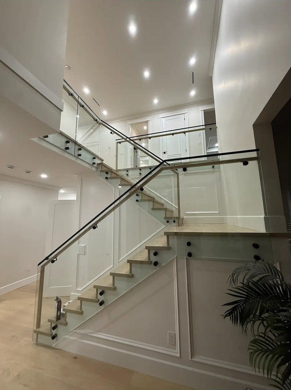 Custom white oak staircase and hardwood floor in Surrey, BC